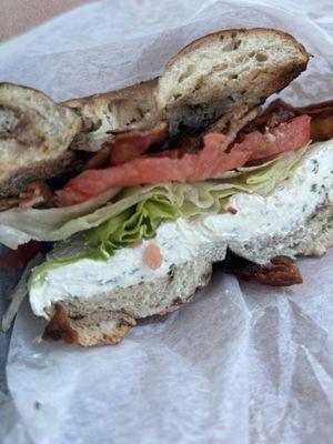 BLT with Bermuda Onion and Chive cream cheese on a rye bagel