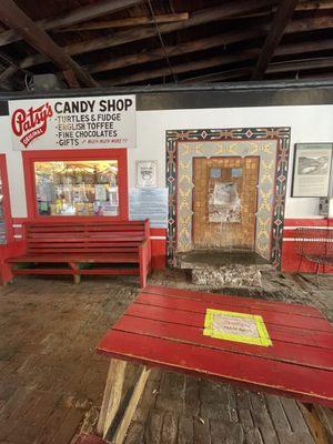 so surreal having a 154 year old (and older) spring coming out of the wall next to a candy shop