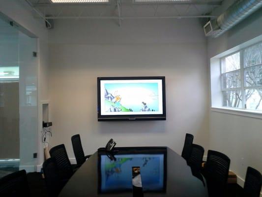 70" smartboard in modern conference room