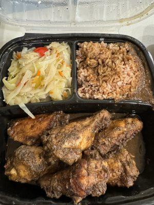 Jerk wings (8) with cabbage & Rice/peas