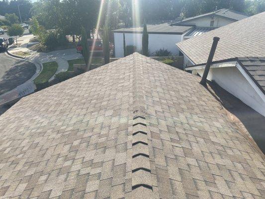 Turned this tile roof into a shingle roof, using materials by Owens Corning.