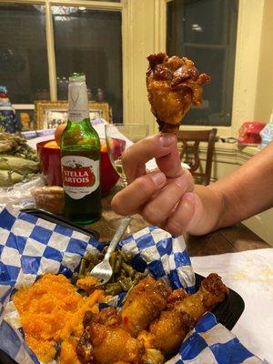 A juicy drumstick wing!  MMM. We chose sweet chili suave and it is mild w a little kick. Delicious.