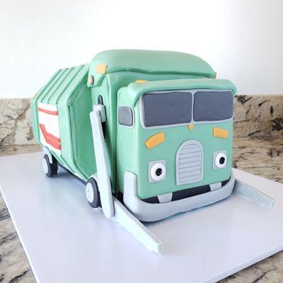 Carved and fondant covered Trash Truck themed cake.