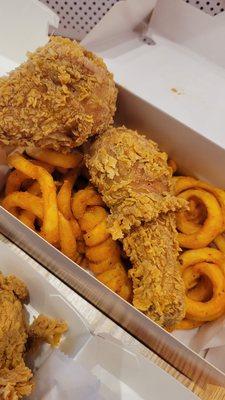 Drumsticks and curly fries