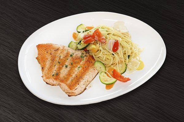 Grilled Salmon: Served with spaghetti Primavera style.