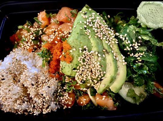 Large poke with raw salmon, avocado, and seaweed salad