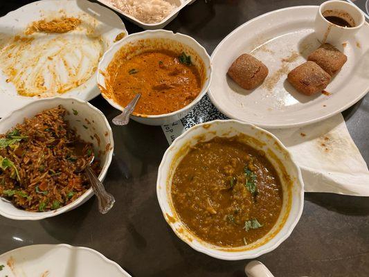 Butter chicken, Fried rice, yellow Dal. Pakora paneer. Sorry didn't get a pic before we devoured it.