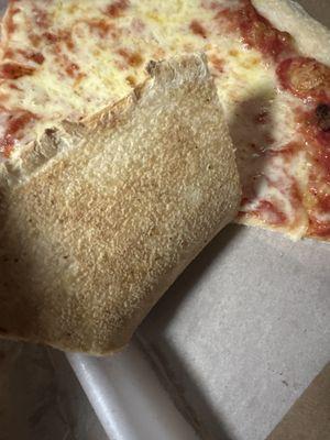 An undercooked pizza