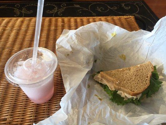 Turkey pesto sandwich with coconut huckleberry lemonade