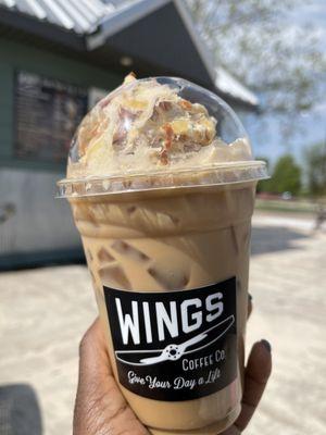 Iced coffee with coconut shavings