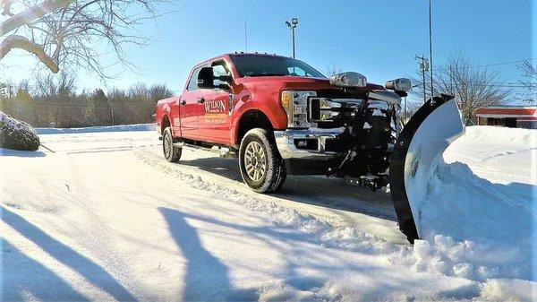 Commercial Snow Removal: Clearing snow from restaurant parking lot before hungry customers arrive.