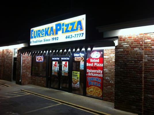 Front of the restaurant at night.