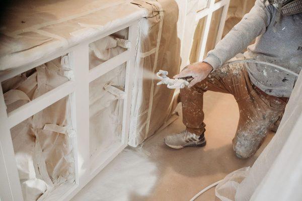 Spraying kitchen cabinets