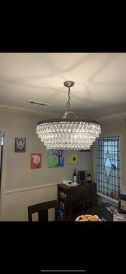 Crystal chandelier installed in dinning room