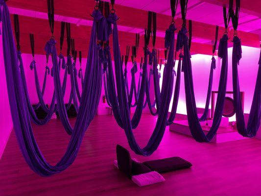 The hammocks and crystal bowls in the meditation studio