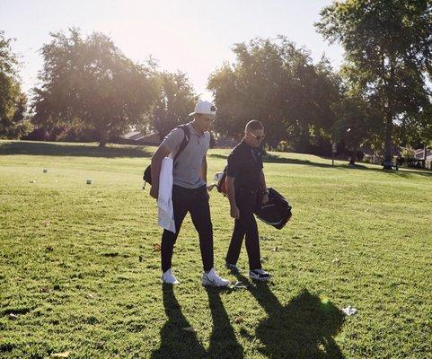 PGA Tour pro Cameron Champ with his coach, Sean Foley.