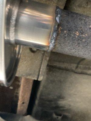 Vibrant muffler welding up close