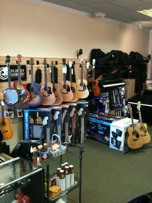 Acoustic guitars, banjos , mandolins, Ukeleles,1/2 size and 3/4 acoustics Fender,Breedlove and Walden and more....