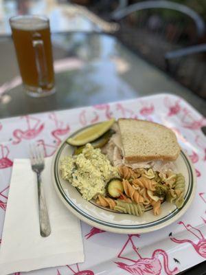 Half Turkey Sandwich with a side of potato salad - pickles and pasta salad from the side bar and a cold blue moon draft beer