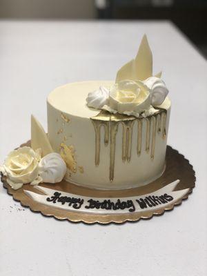 Red velvet tres leches cake with gold drip and gold flakes!