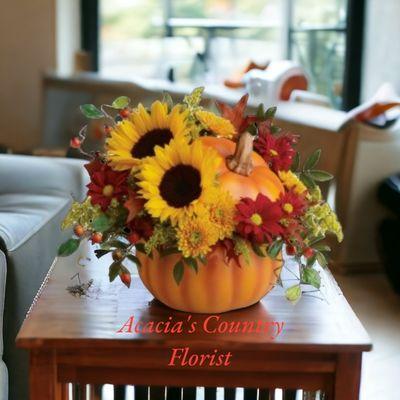 Autumn flowers in pumpkin