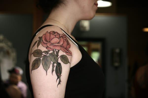 Rose tattoo by Alice Carrier