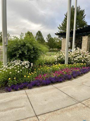 So many lovely flowers here and benches to admire them from.