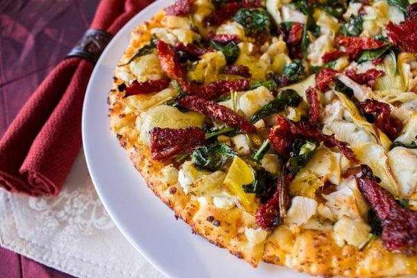 Greek Slice - Sun Dried Tom. Garlic Cream Sauce, Feta Cheese, Sauteed Spinach, Sun Dried Tomatoes, Artichokes & Rosemary Chicken