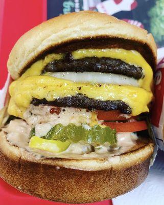 Double Double, Animal Style  with chopped chilis, extra tomatoes  and whole grilled onion