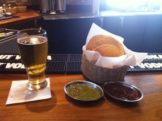 Unique chips with two salsa, smokey red sauce and  tomatillo green sauce.  If you like it spicy ask for the tasty Habanero sauce