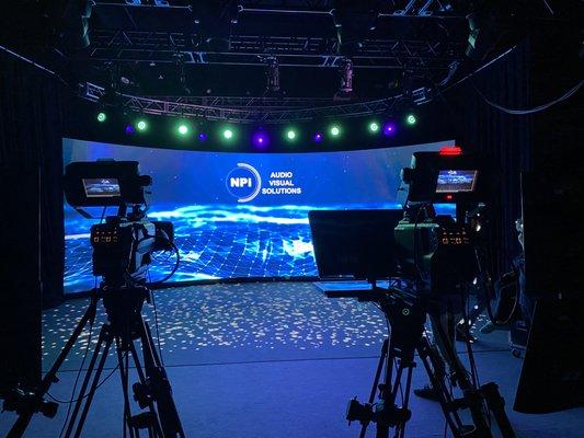 Virtual Studio, broadcast cameras, telepromter, livestream, curved LED wall, custom lighting, content creation