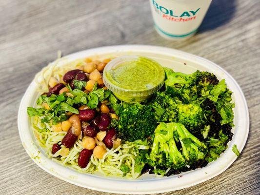 Regular bowl - cilantro noodles, forbidden rice, power beans, ginger broccoli and more cilantro!