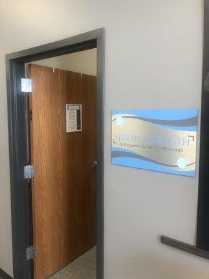 Room entrance with new signage