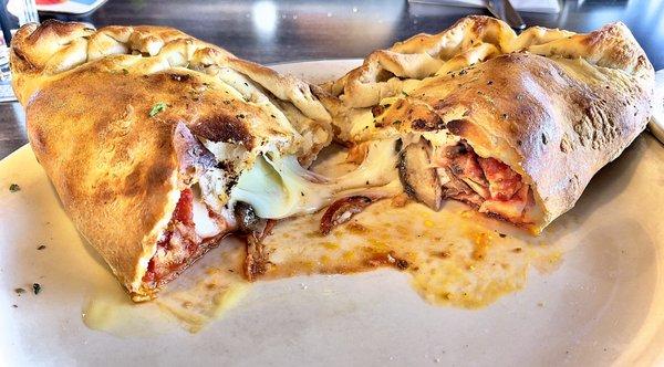 Pepperoni, Sausage, and Mushroom Calzone