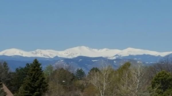 The view from the putting green with Mt. Evans in the distant.