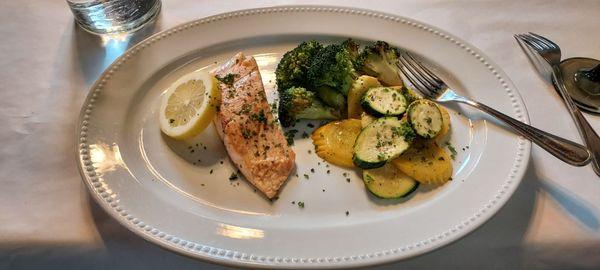 Salmon with grilled vegetables, cooked to perfection.