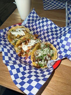 Fish taco, shrimp taco, carnitas taco