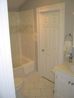 Bathroom renovation.  Work included relocating laundry room, complete demolition & reconstruction and vaulting the ceiling.