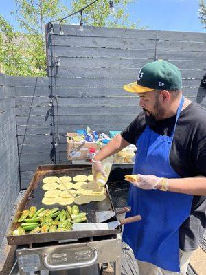 Abel cooking up his famous Jalapeño tacos which are bomb!