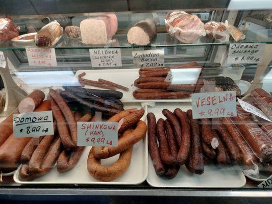 Below: Pork sausages and bacon (sold by the pound; you can ask for half a link); the darkest ones are Black Forest Ham sausage.  Score!!