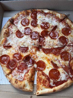 Double pepperoni where one of the slices only has two pieces of pepperoni on it.