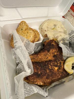 Blackened redfish with garlic mash potatoes (caesar salad not pictured)