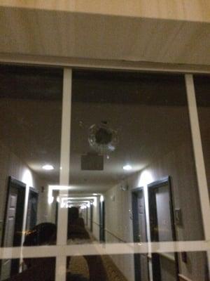 Hole in hallway window