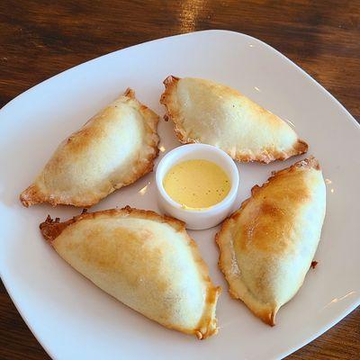 Baked empanadas 
Ground chicken, ground beef, spinach and cheese, pepperoni and cheese.