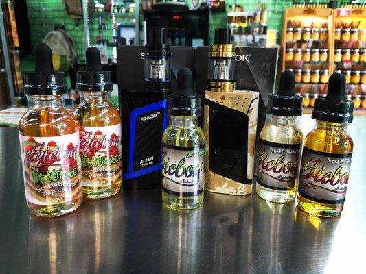 Smok Alien e-cigarette and Sicboy Industries premium e-liquid.