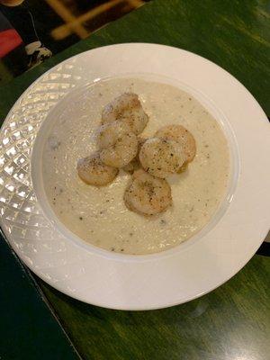 Shrimp and grits with truffle oil