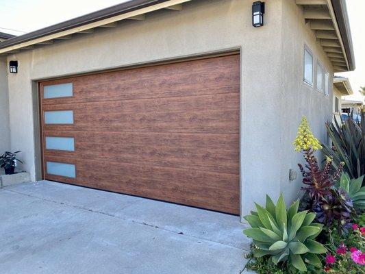 Mid - tone wood with white laminated glass