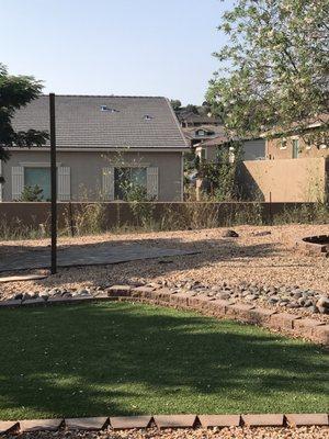 Unfinished drainage ditch. Now a weed farm compliments of Dorn Homes