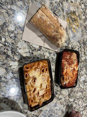 Chicken parm and bolognese, with bread.