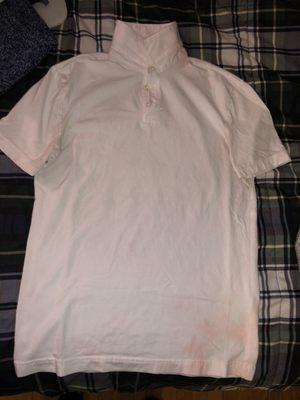 Bad lighting I know, but this was a new white polo that is discolored with Red stains throughout. Tried bleaching, did not help at all.